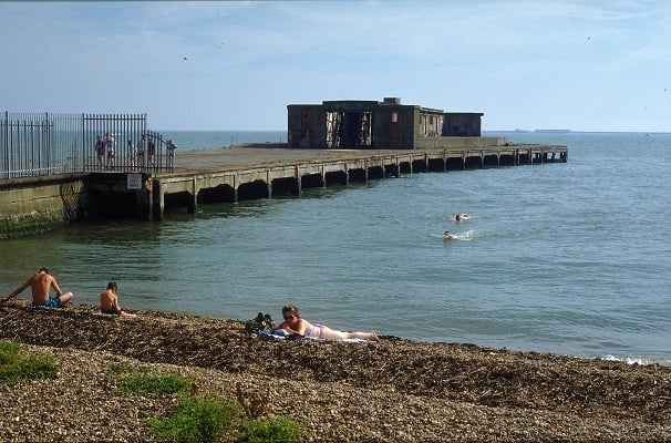 Costa del Shingle: sunbathers on a pebble beach Southend-on-Sea UK 1990’s